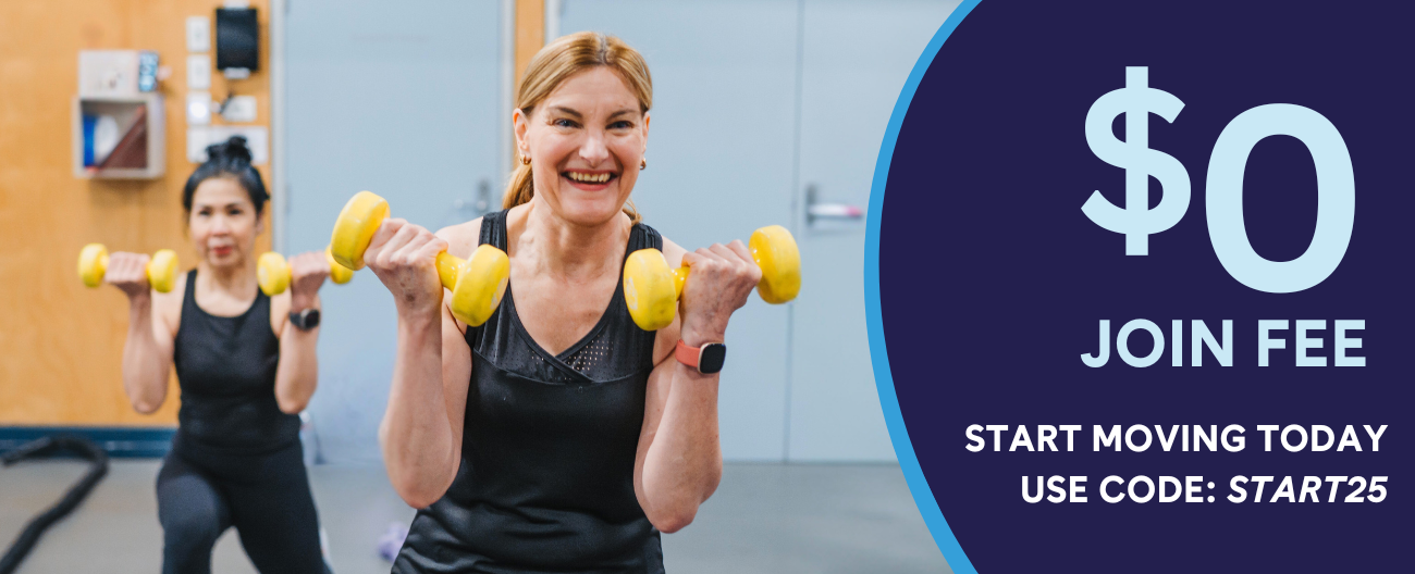 Two women smiling and holding dumbbells in a group fitness class. Text overlay that reads '$0 join fee - Start Moving Today - Use Code: START25'
