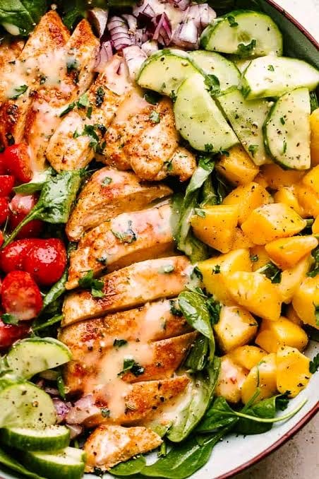 Crumbed chicken mango salad with Nahm jim  dressing