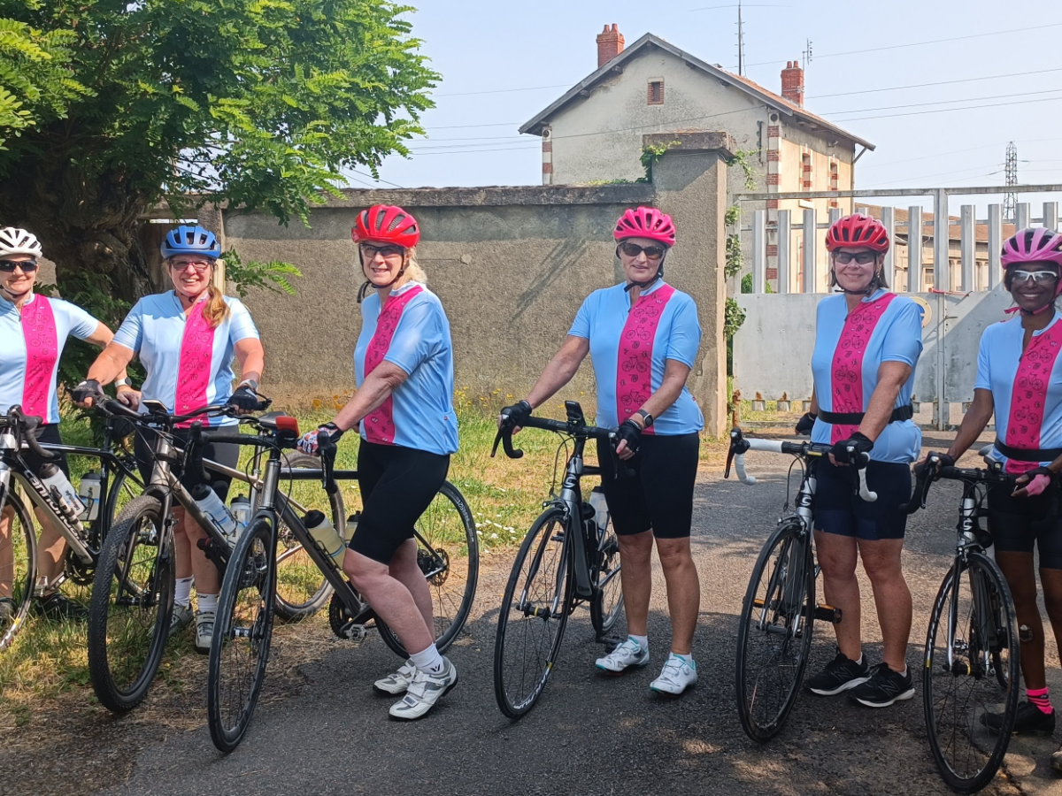 Cyclists pose with their bikes in France