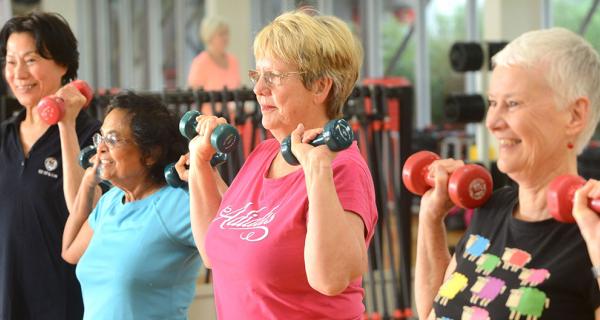 ladies lifting small weights