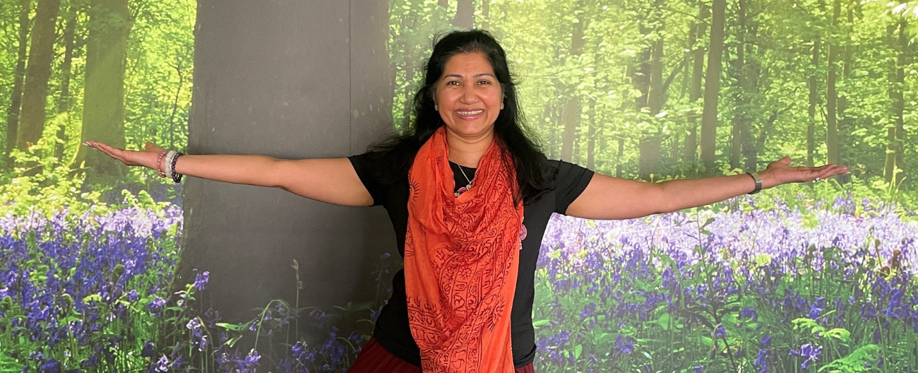 Image of Instructor, Mitha, Standing in Tree Pose